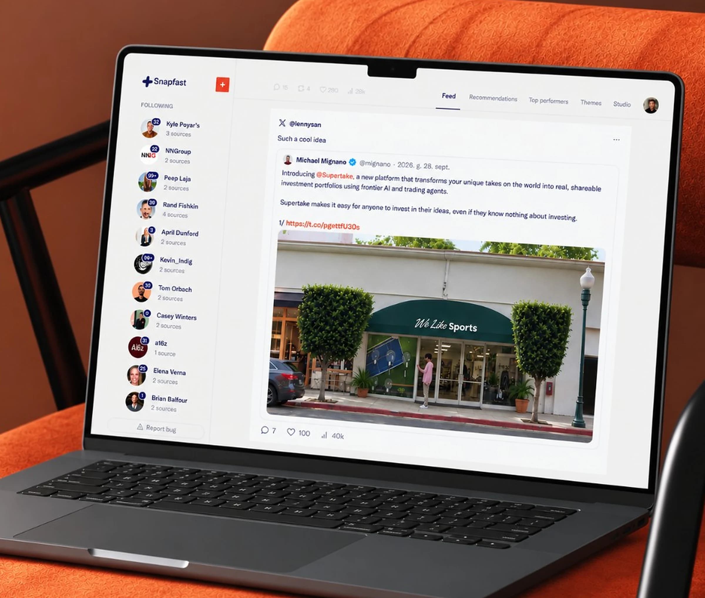 Snapfast open on a laptop, resting on an orange chair